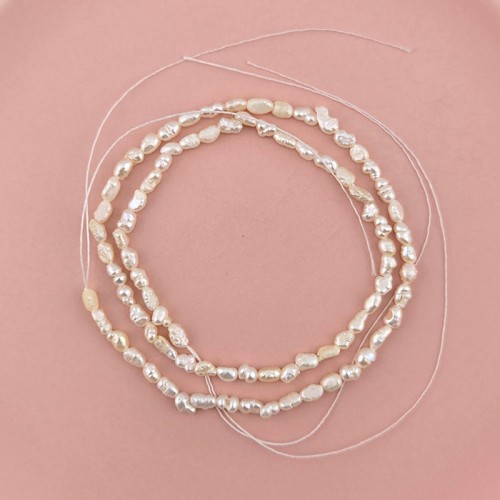 비즈팡 [DP-1-02]담수진주 못난이쌀알 3-4x4mm 크림 ,1줄(약35cm미만)